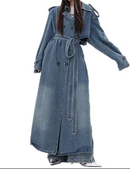 Timeless style meets street wear. Soft, premium cotton denim trench coat with wide lapels, epaulets, and an adjustable waist belt. Complete your transitional wardrobe today!