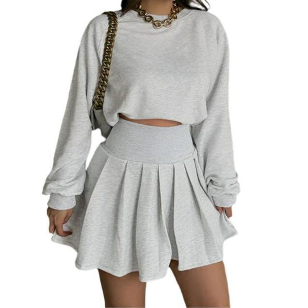 Elegant Knit Pleated Set – A Cozy Sweater and Skirt Duo with Timeless Elegance