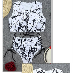Sizzle by the Shore: Black and White Split Tied Bikini Swimwear for Fashion-Forward Women